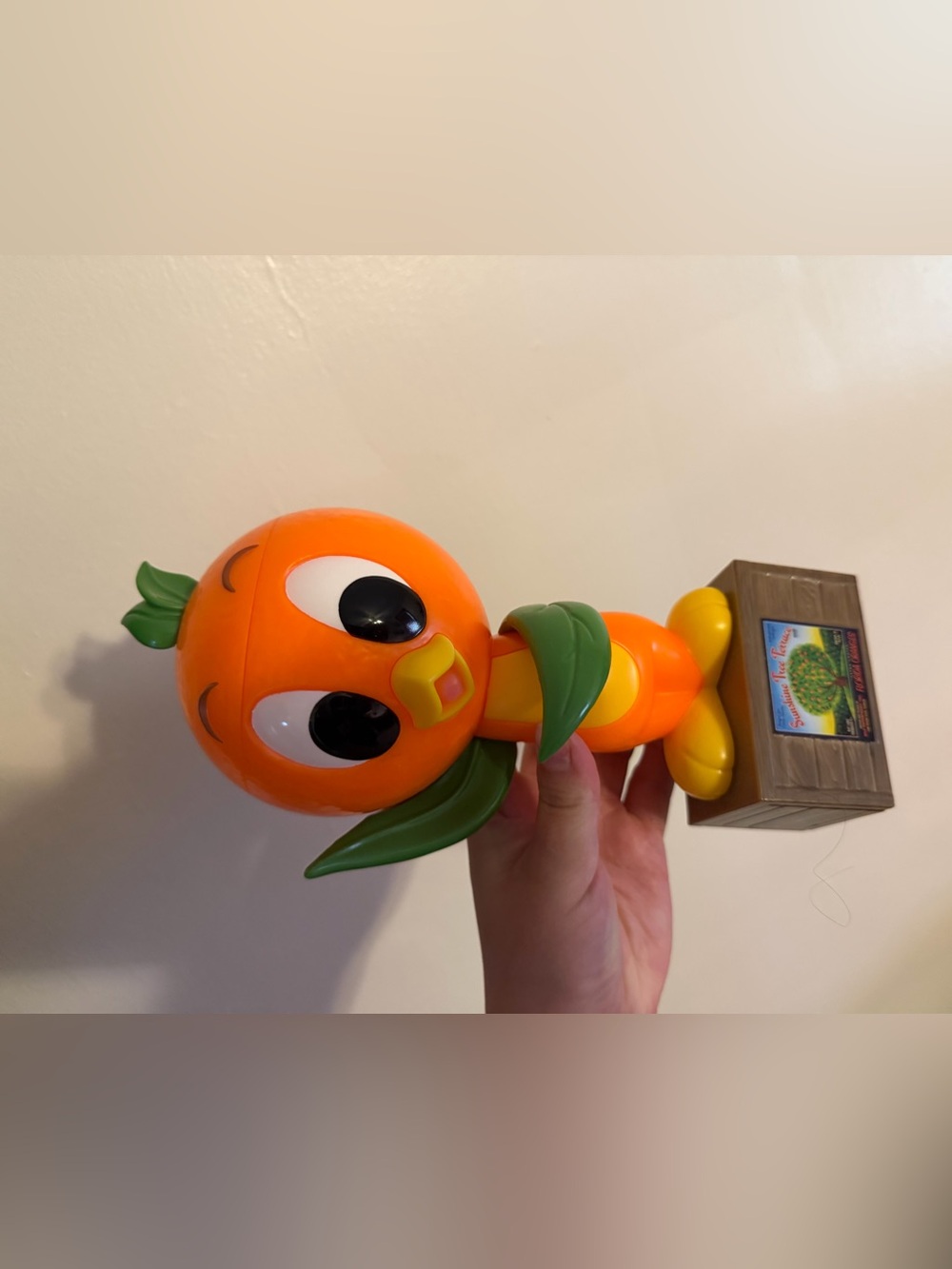 Disney Orange Bird Figure with Green Leaf Accent and Yellow Feet